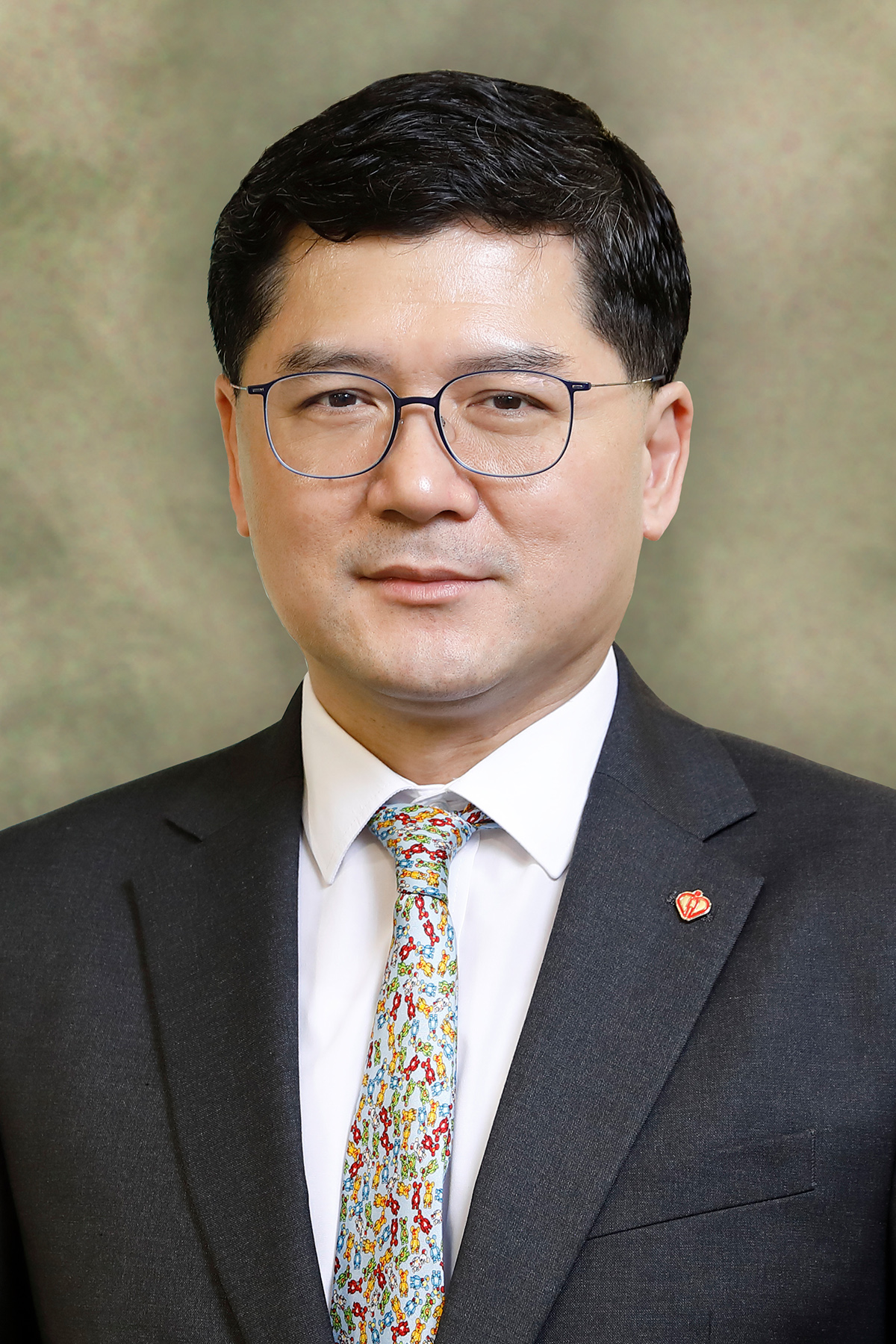 Photo of Dr. KO Pat Sing, Tony